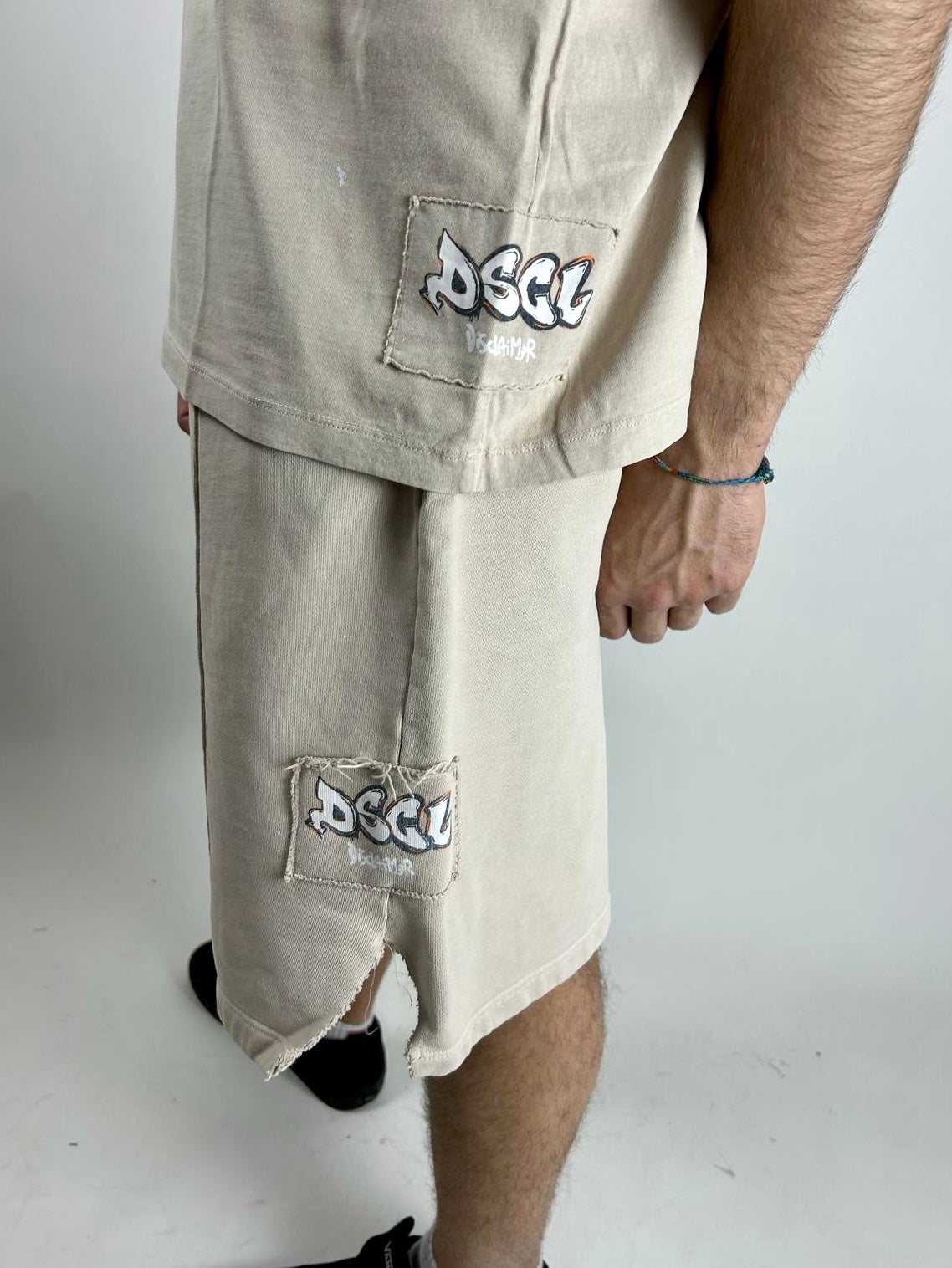 Shorts Logo, Beige - Disclaimer