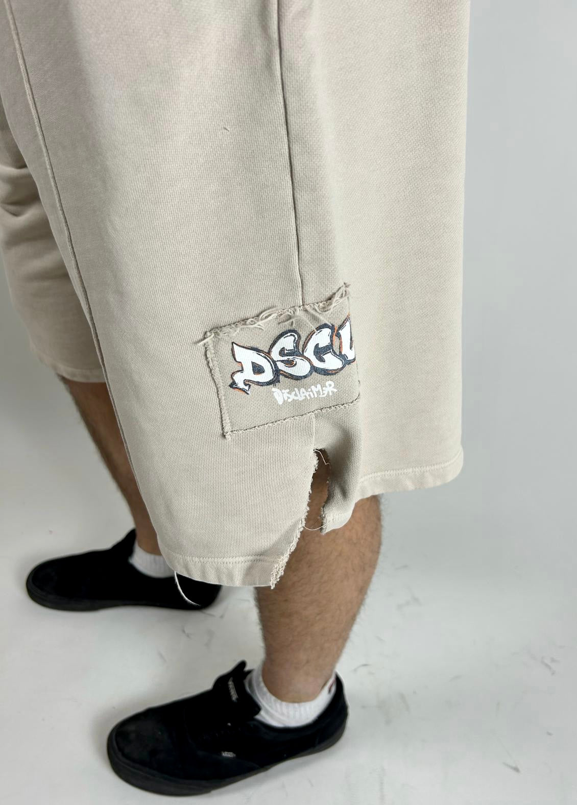 Shorts Logo, Beige - Disclaimer